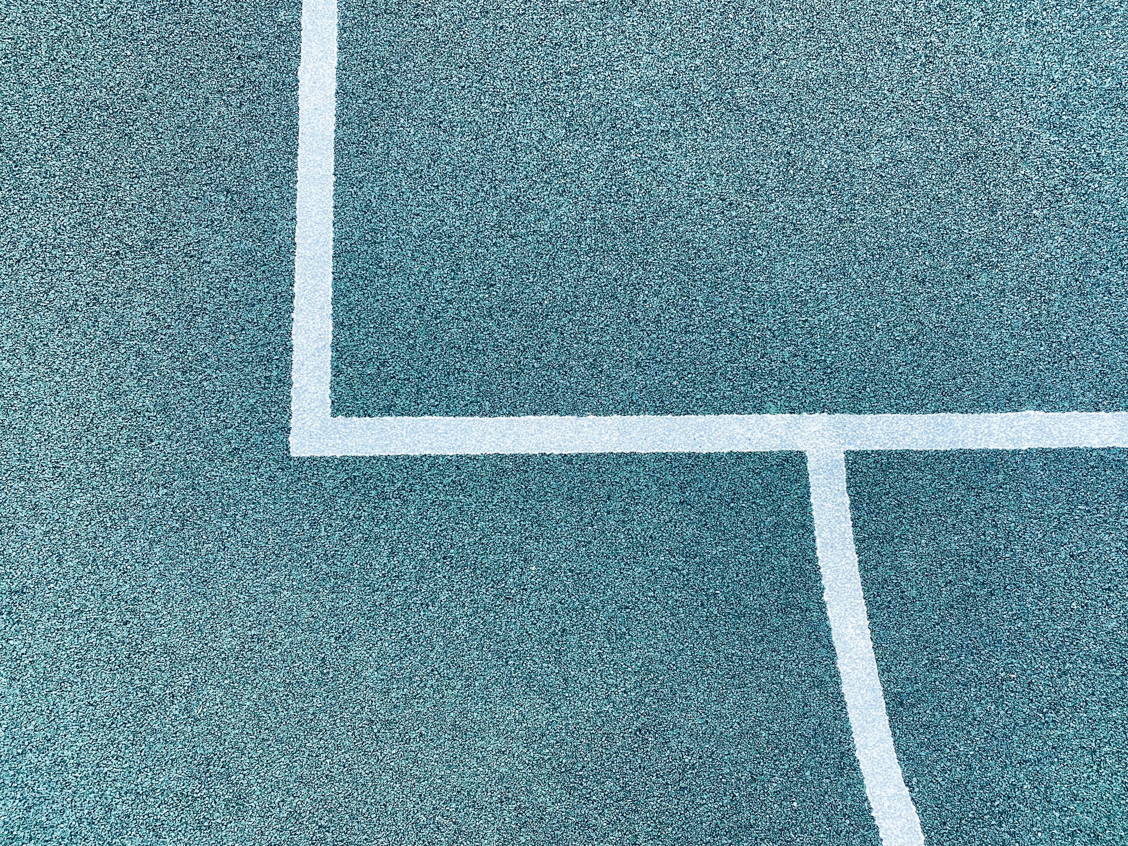 a white line on a blue surface