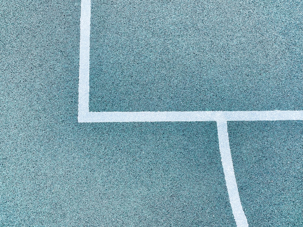 a white line on a blue surface