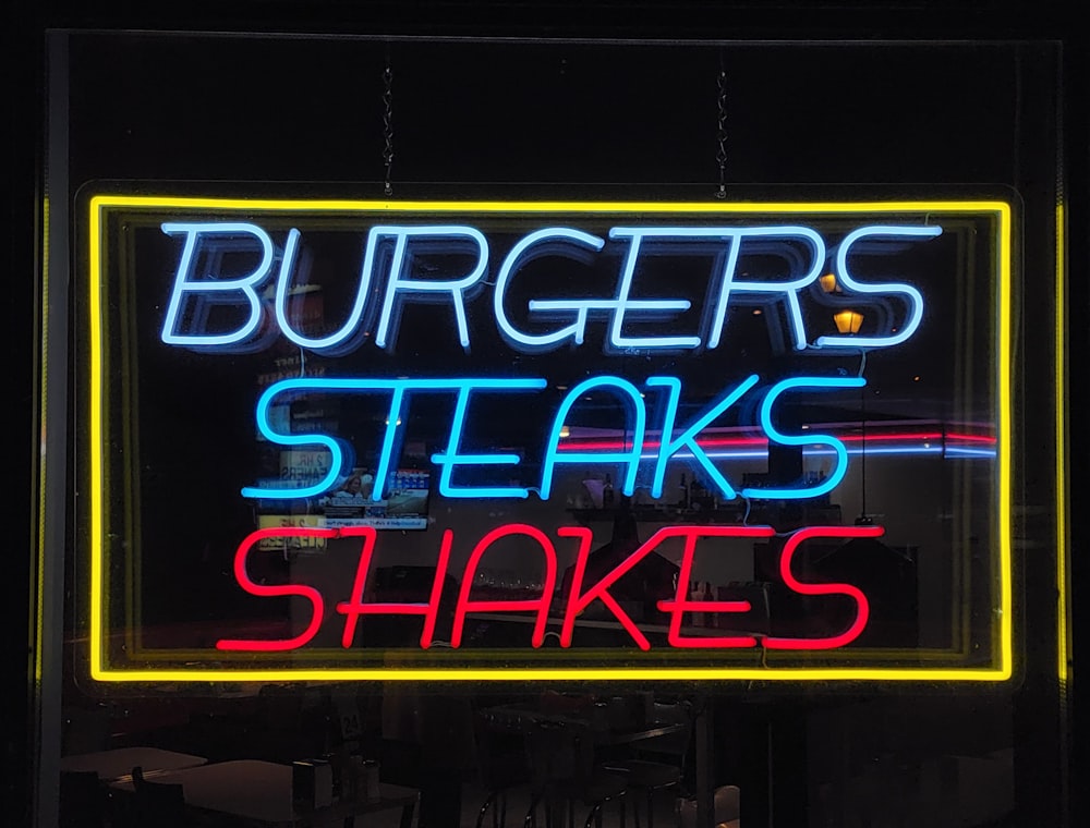 a neon sign with blue text