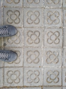 Close-up of colorful stamped concrete floor with intricate patterns.