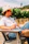 A man enjoying a wine tasting outdoors with vineyards in the background