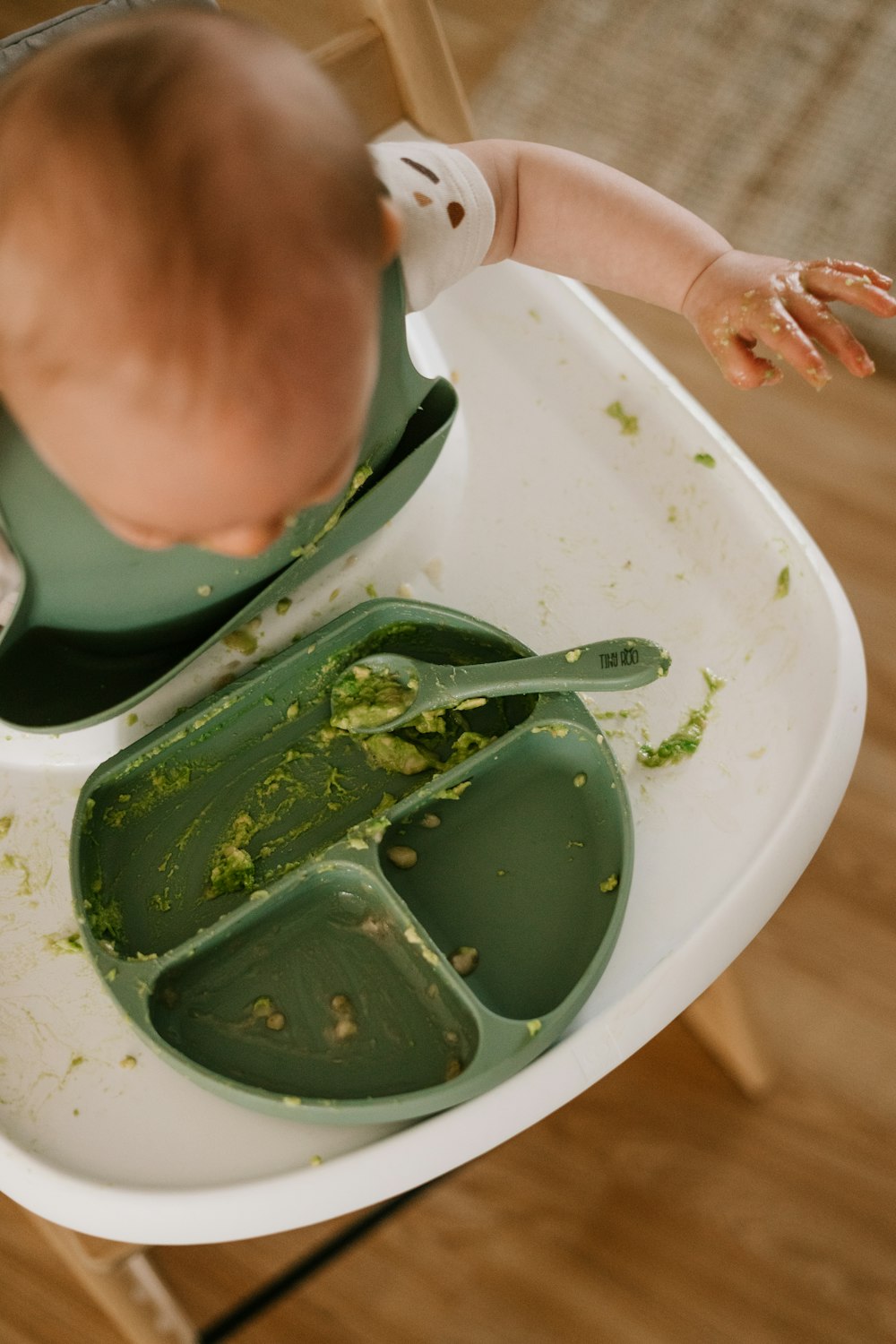 a person holding a bowl of soup