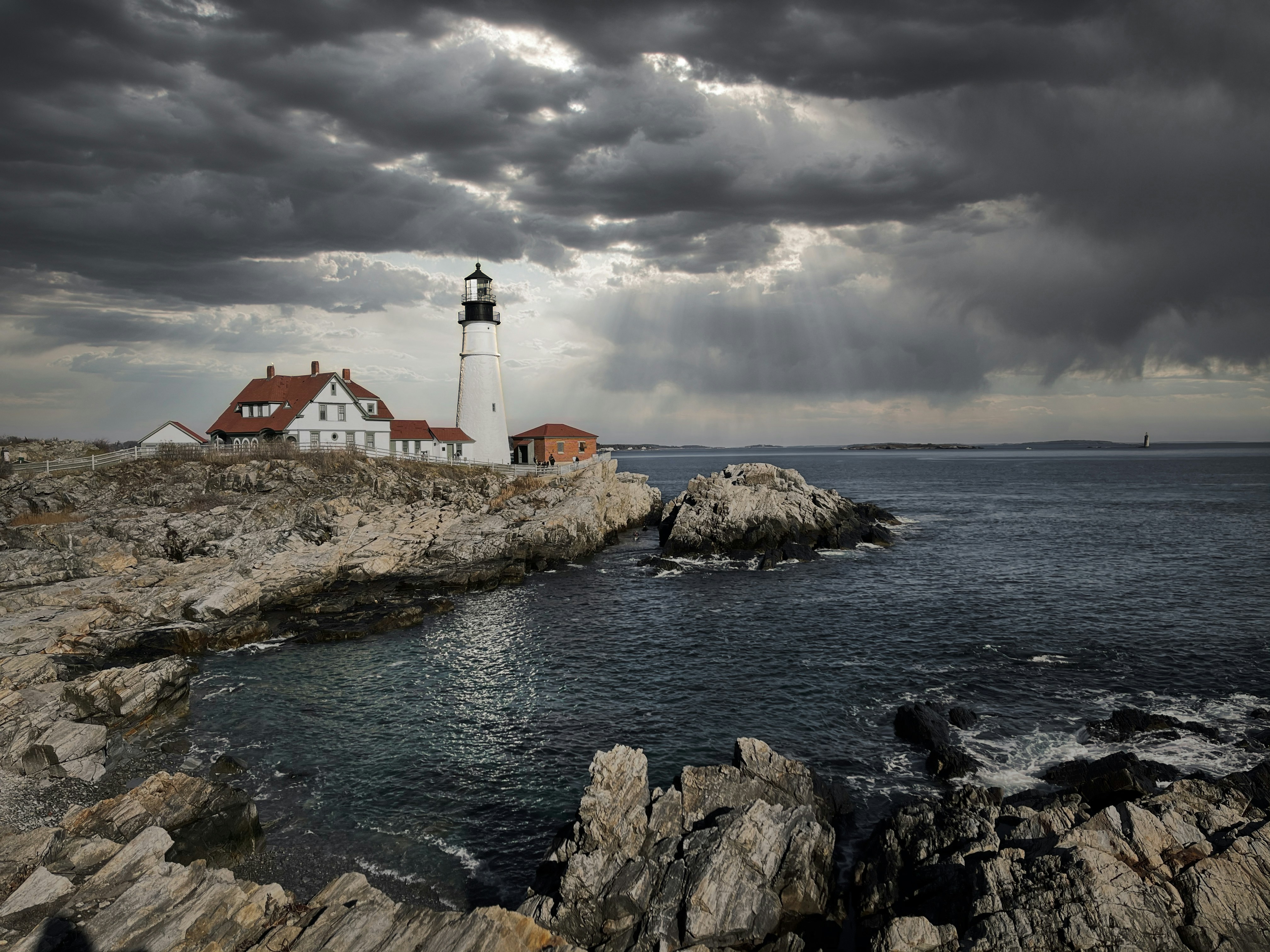 a lighthouse on a rocky shore