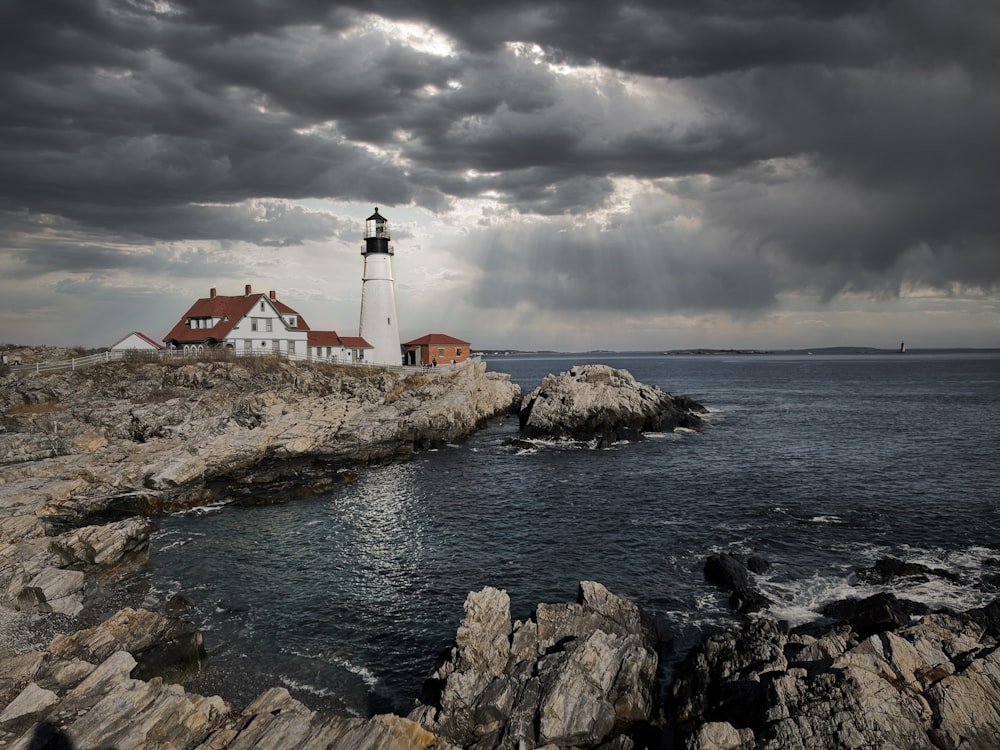 a lighthouse on a rocky shore