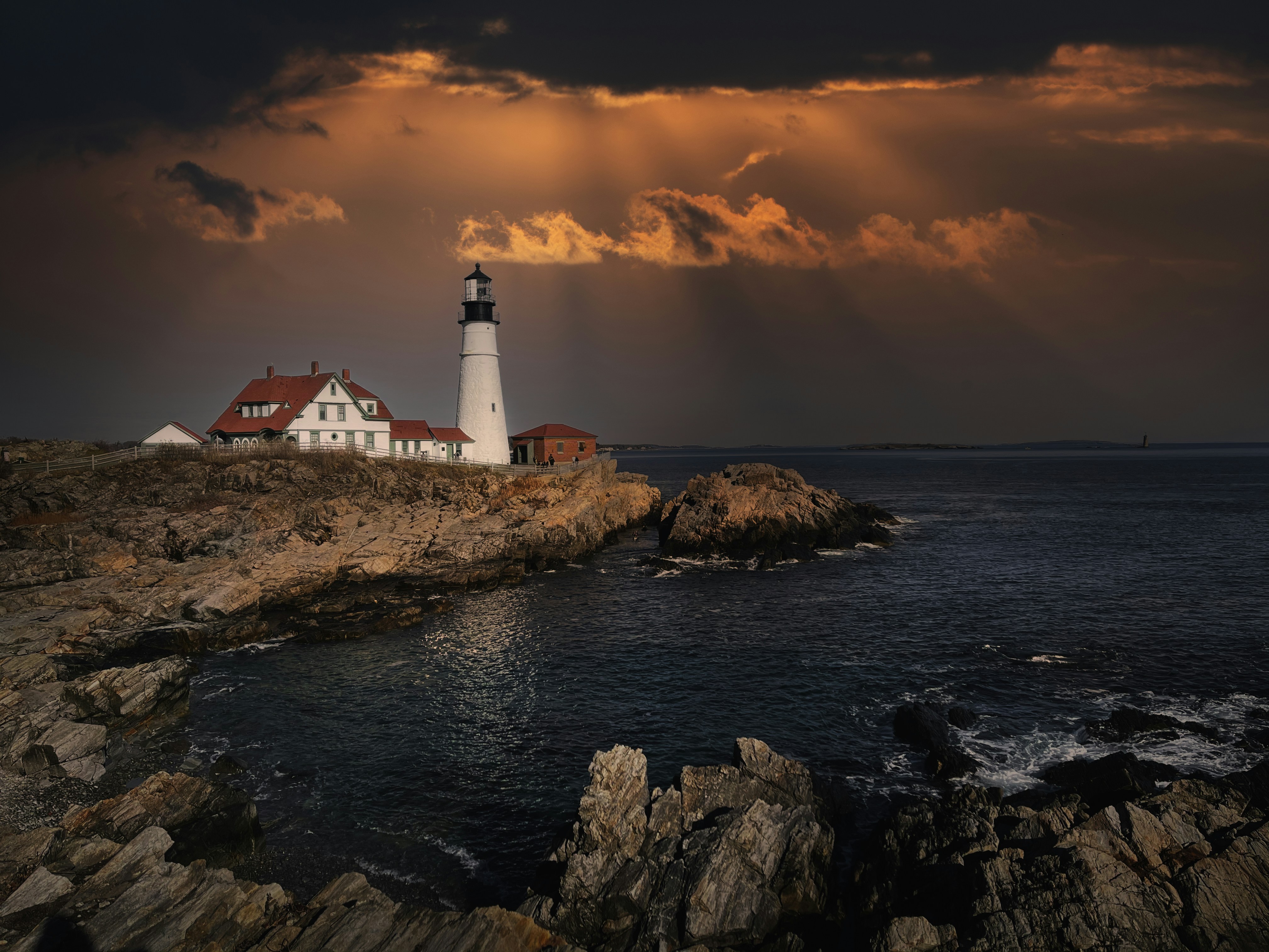 a lighthouse on a rocky shore