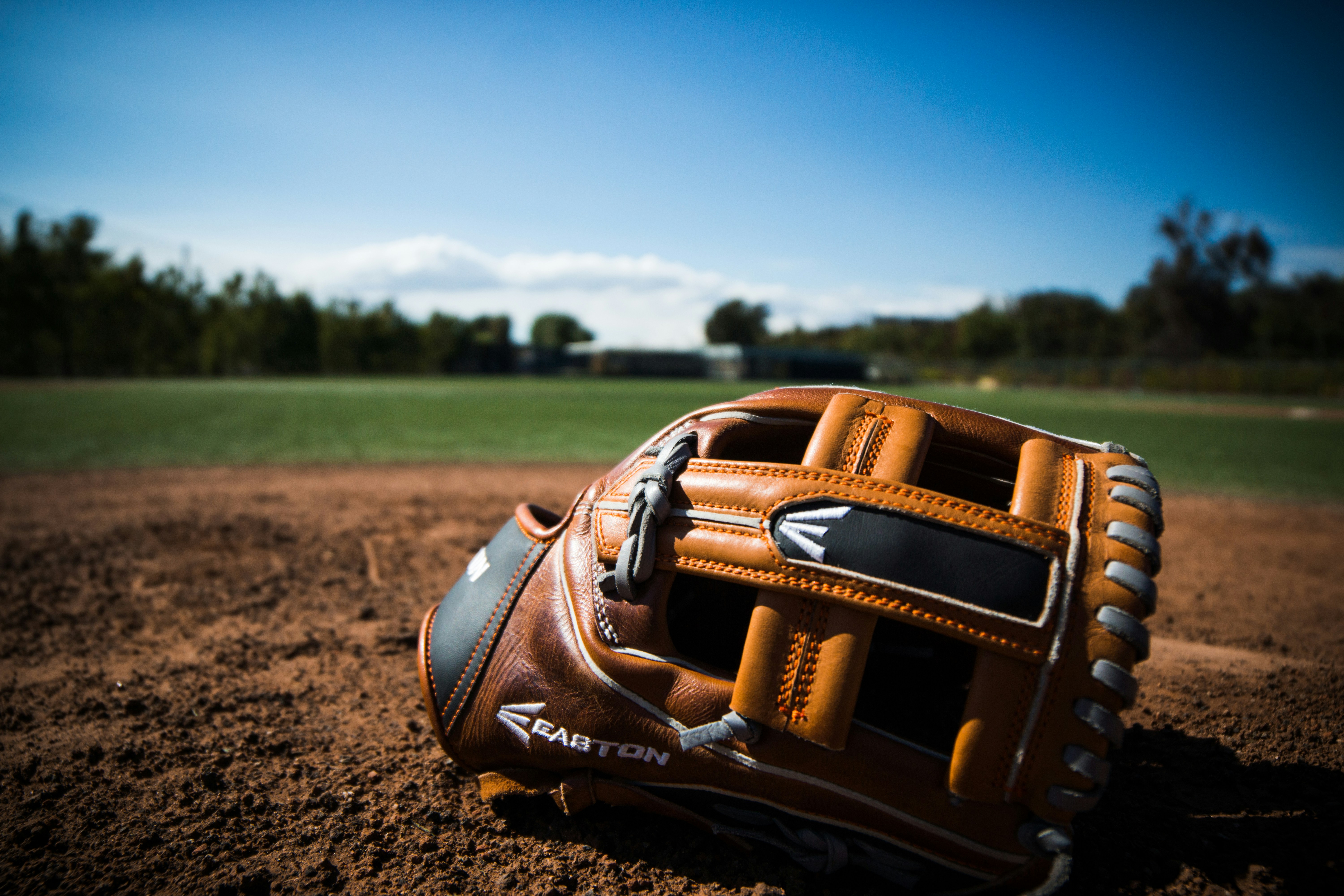 ball glove on dirt.