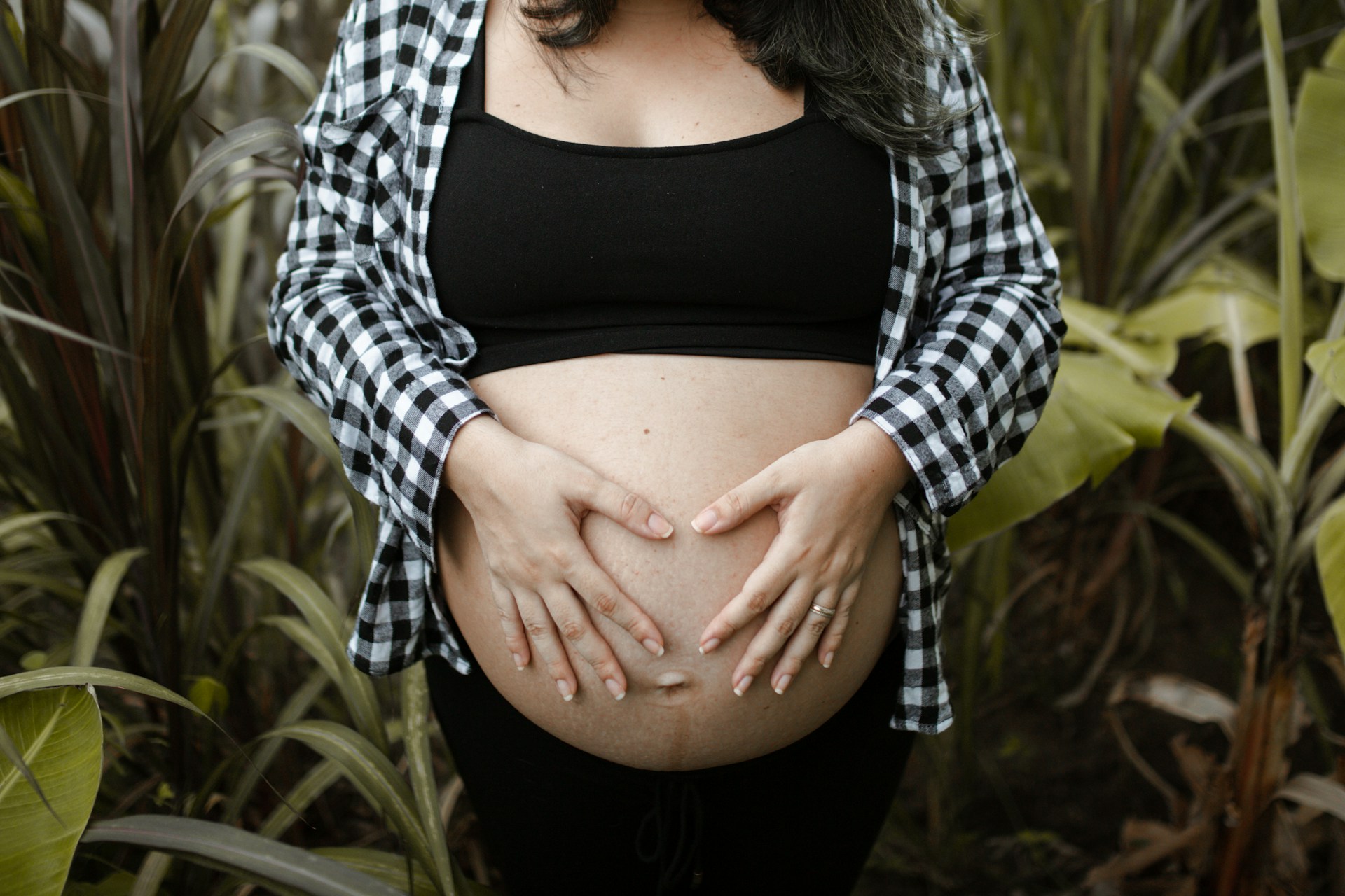 a woman holding her belly