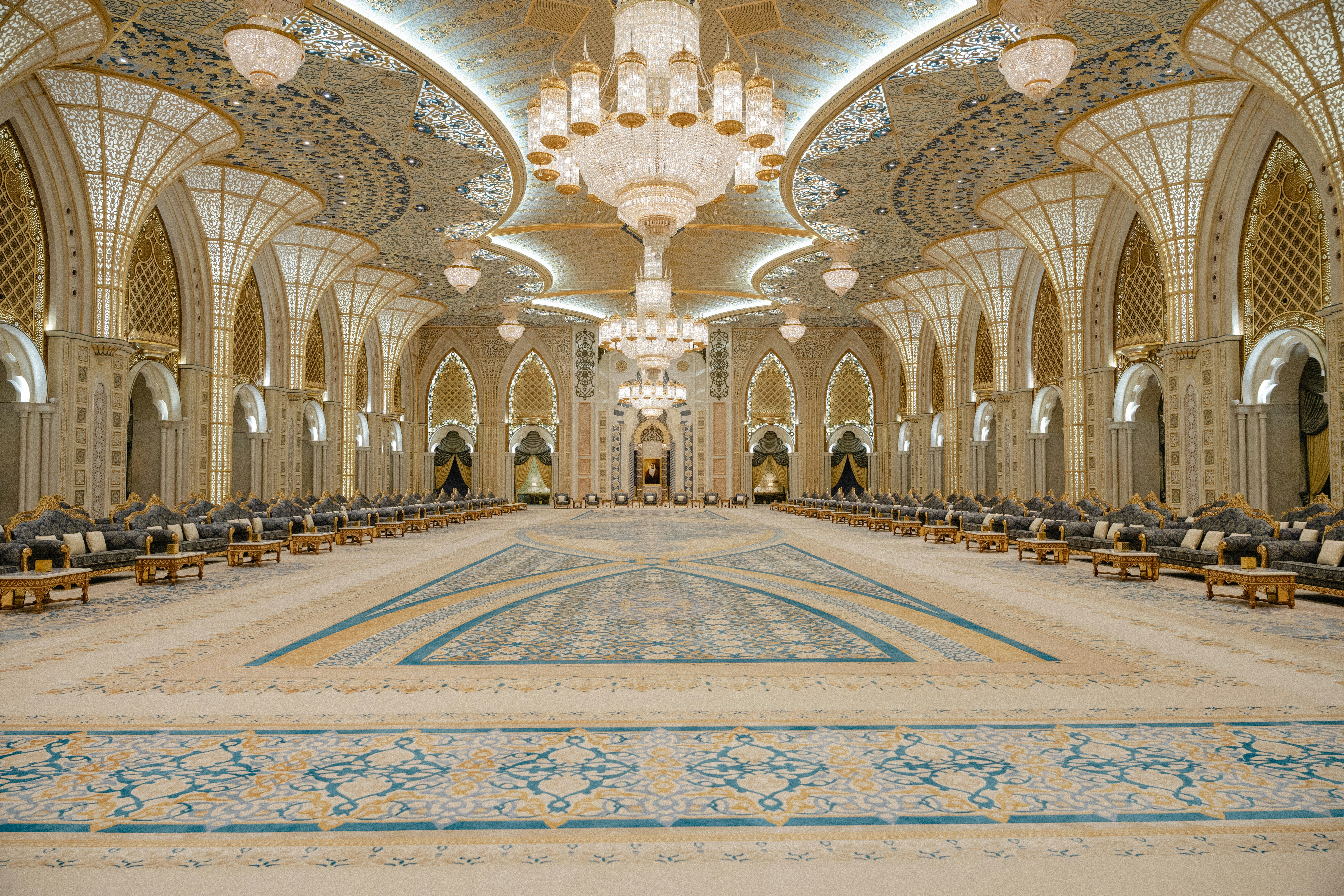 a large room with a large chandelier and a large pool, One day in Abu Dhabi: amazed by this amazing architecture and interesting contrast with Dubai. 