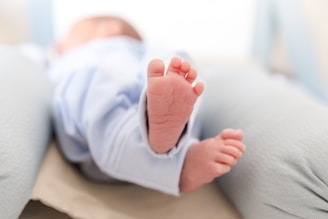 a person holding a baby