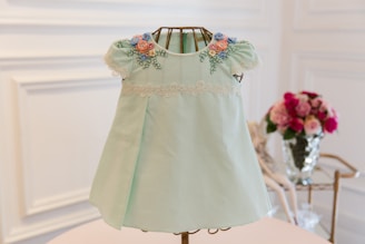 a wedding dress on a table