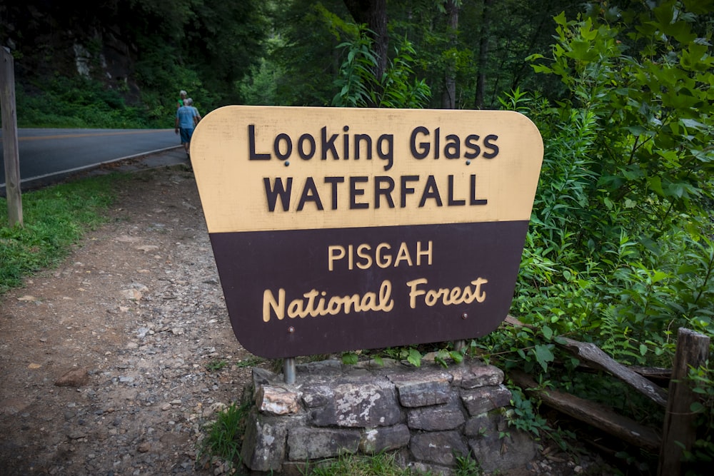 a sign on a rock