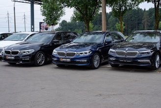 a group of cars parked in a parking lot