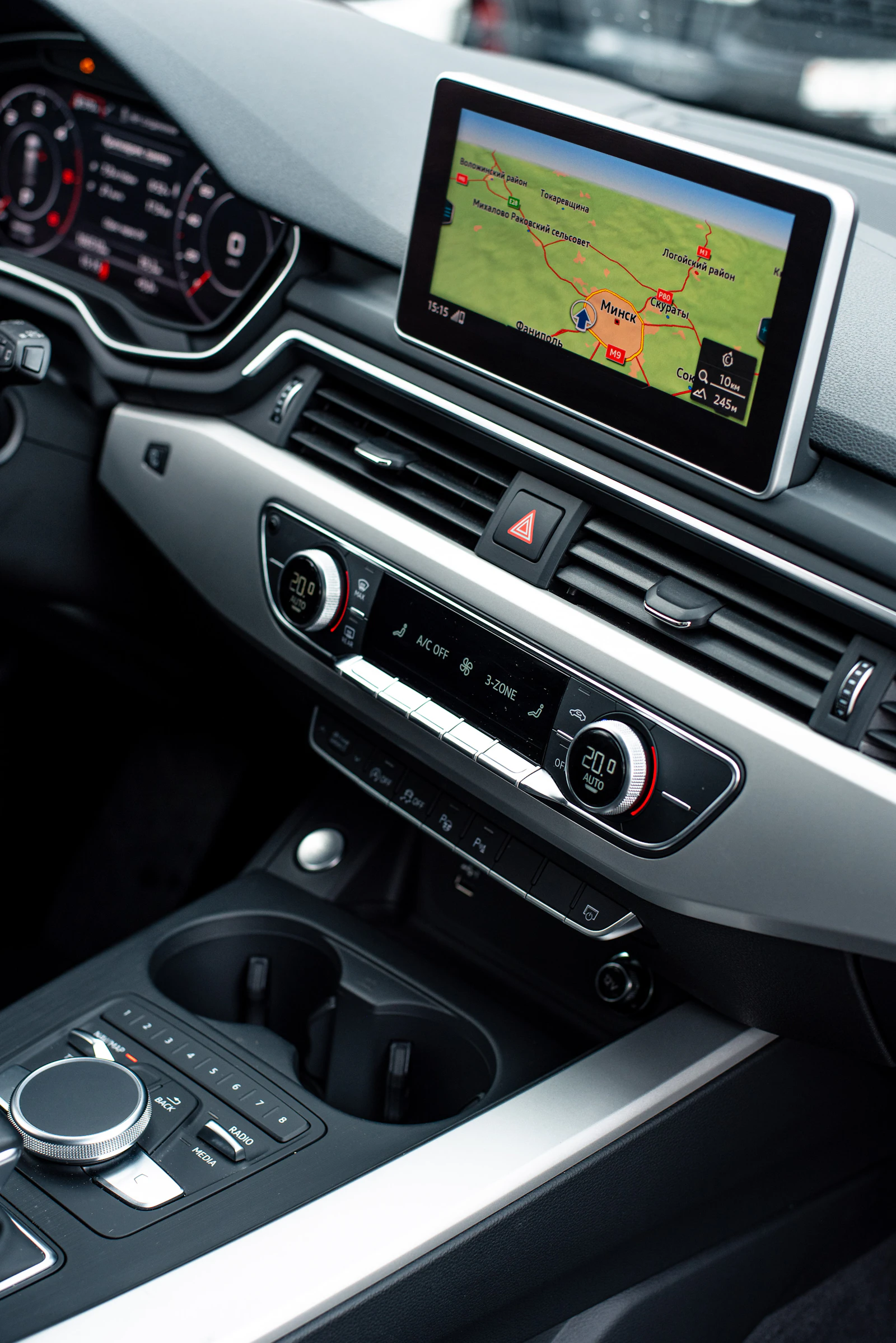 A car dashboard with a game on the screen