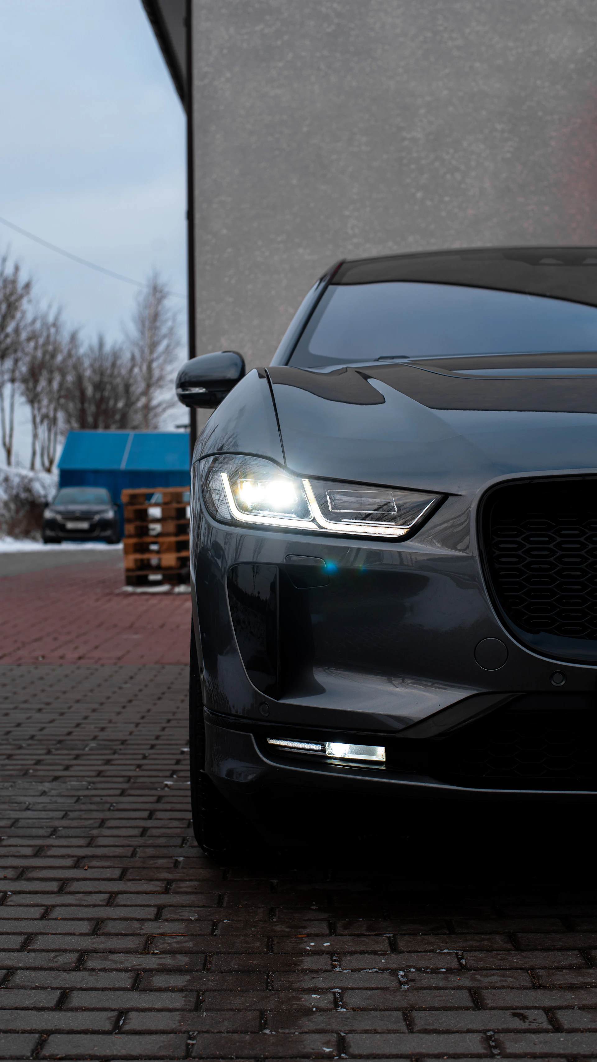 a car parked on a brick road