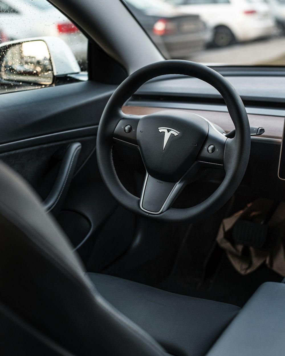 a steering wheel and dashboard of a car