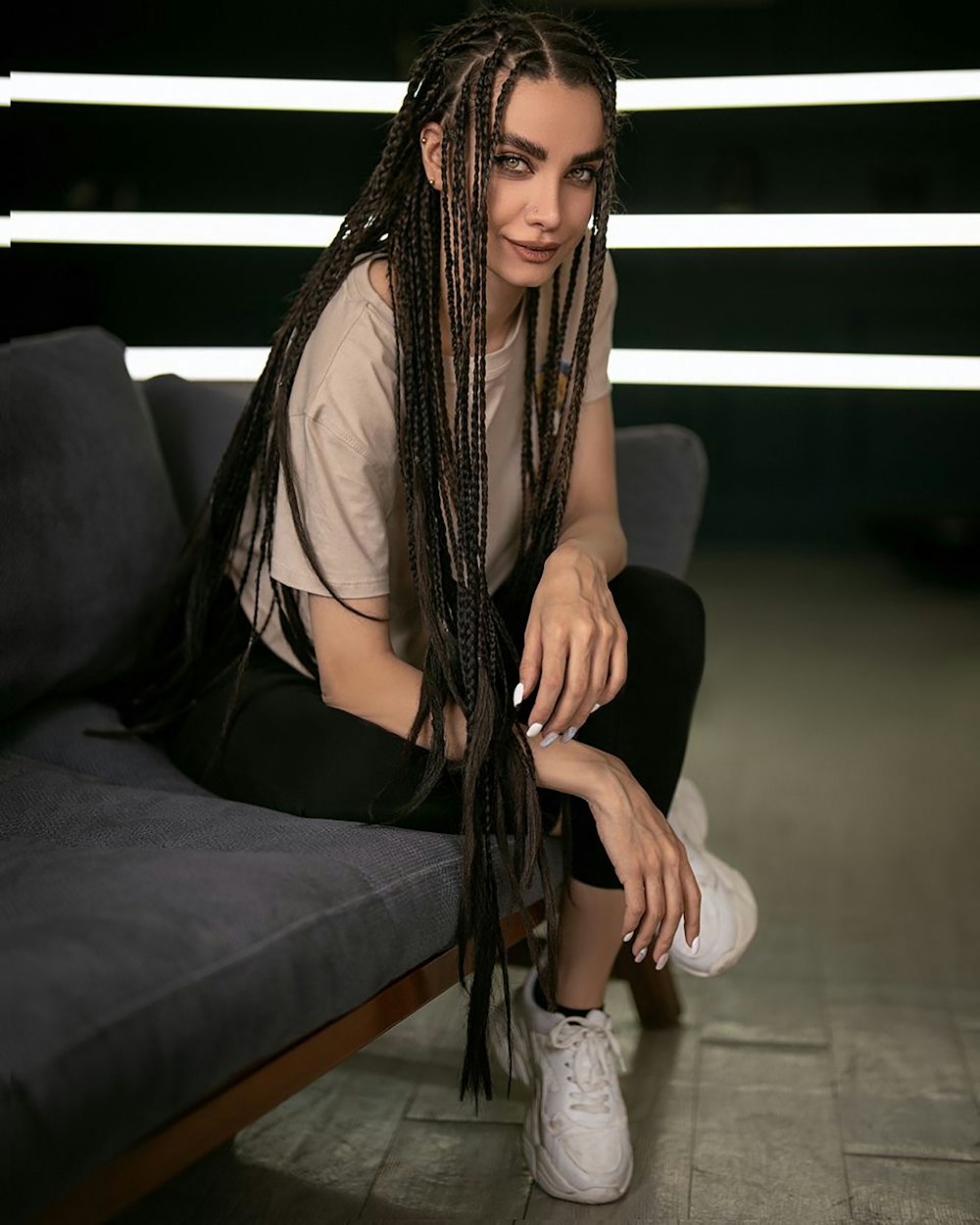 a woman sitting on a couch