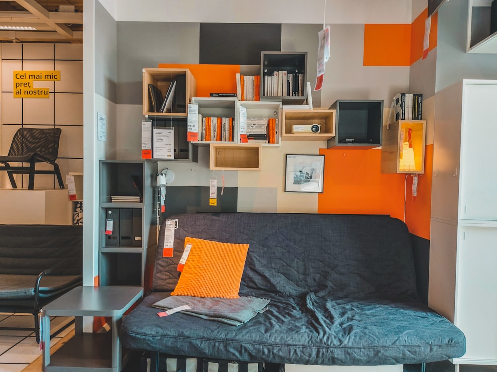 a room with a couch and shelves