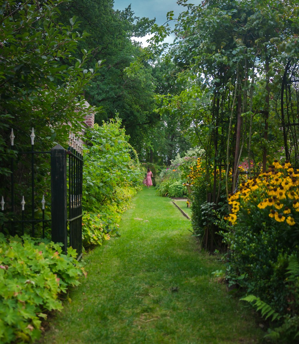 a person walking in a garden