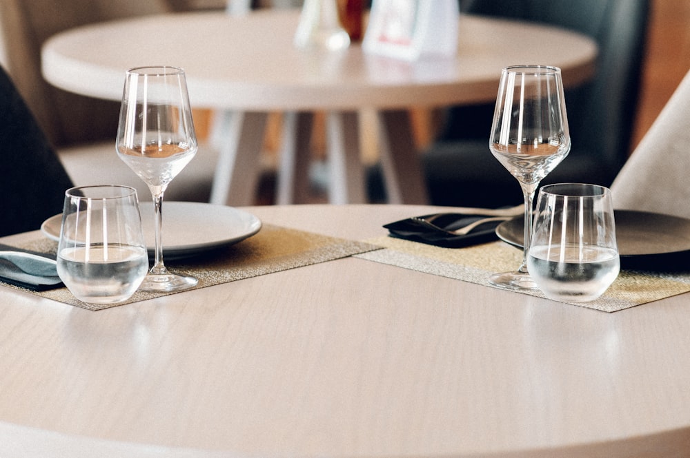 a set of wine glasses on a table