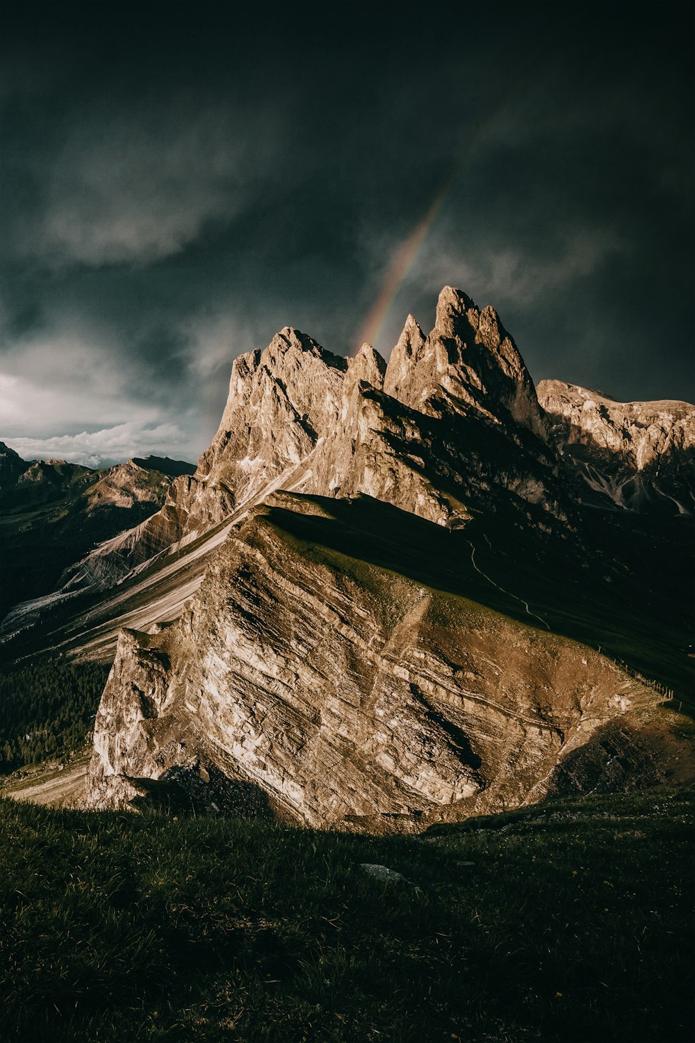 a mountain with a rainbow