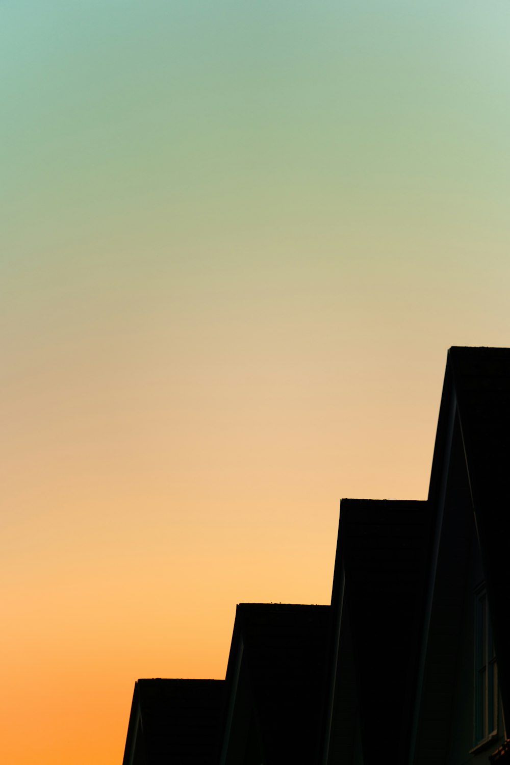 a row of buildings against a blue sky