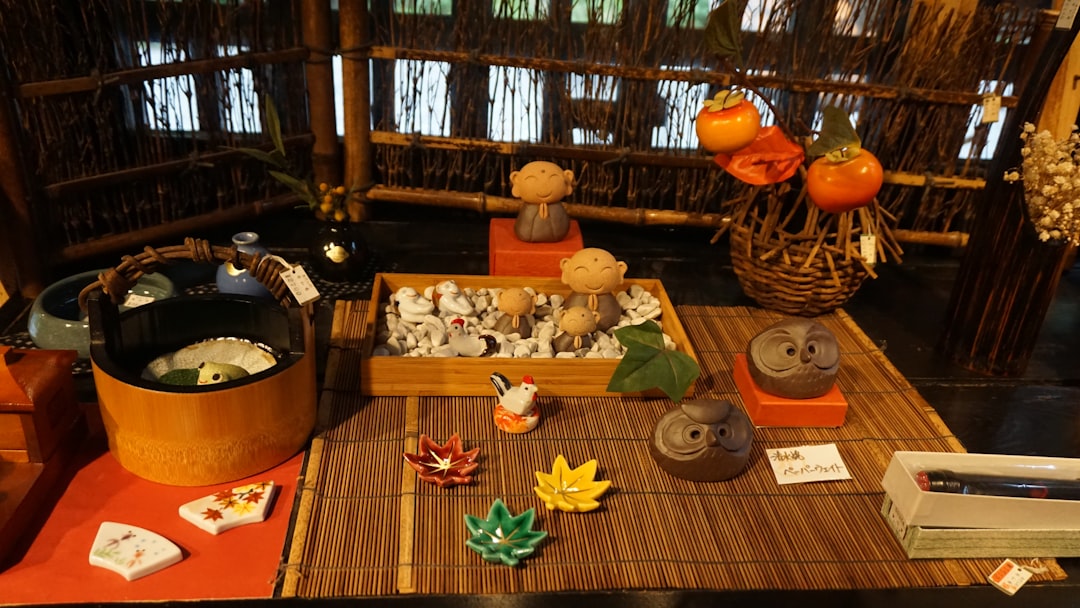 a table with a basket of vegetables and a basket of pumpkins,