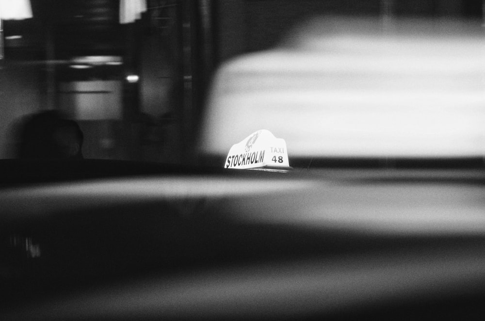 a black and white photo of a hat on a table