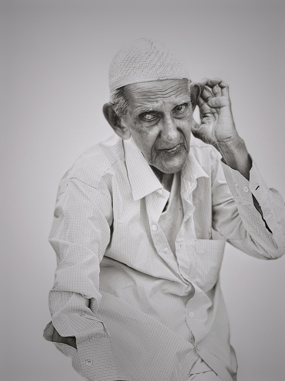 a man wearing a white robe