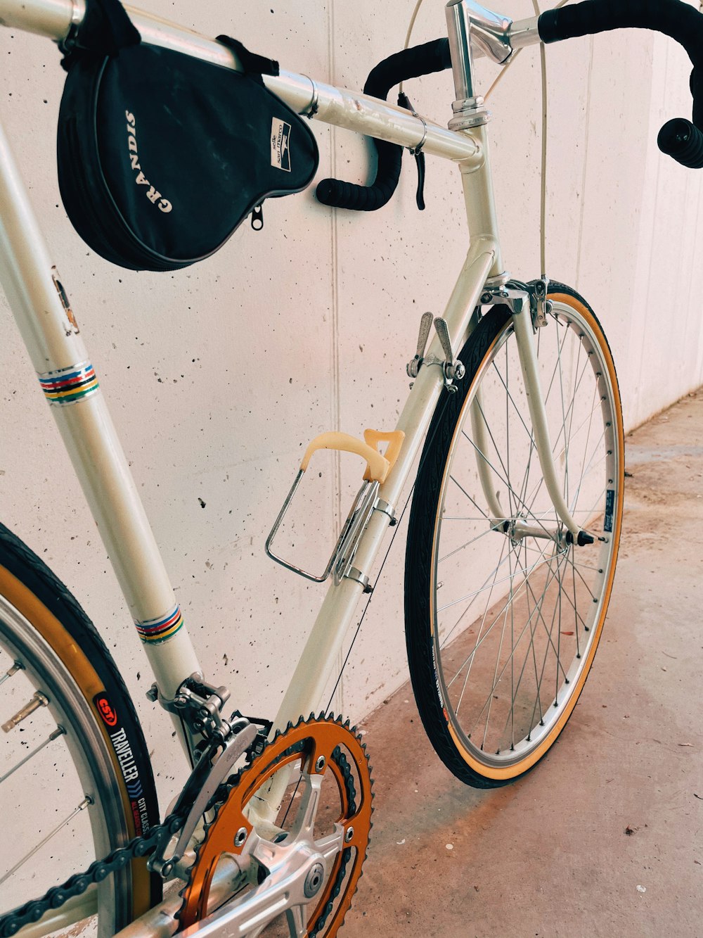 a white bicycle with a black seat