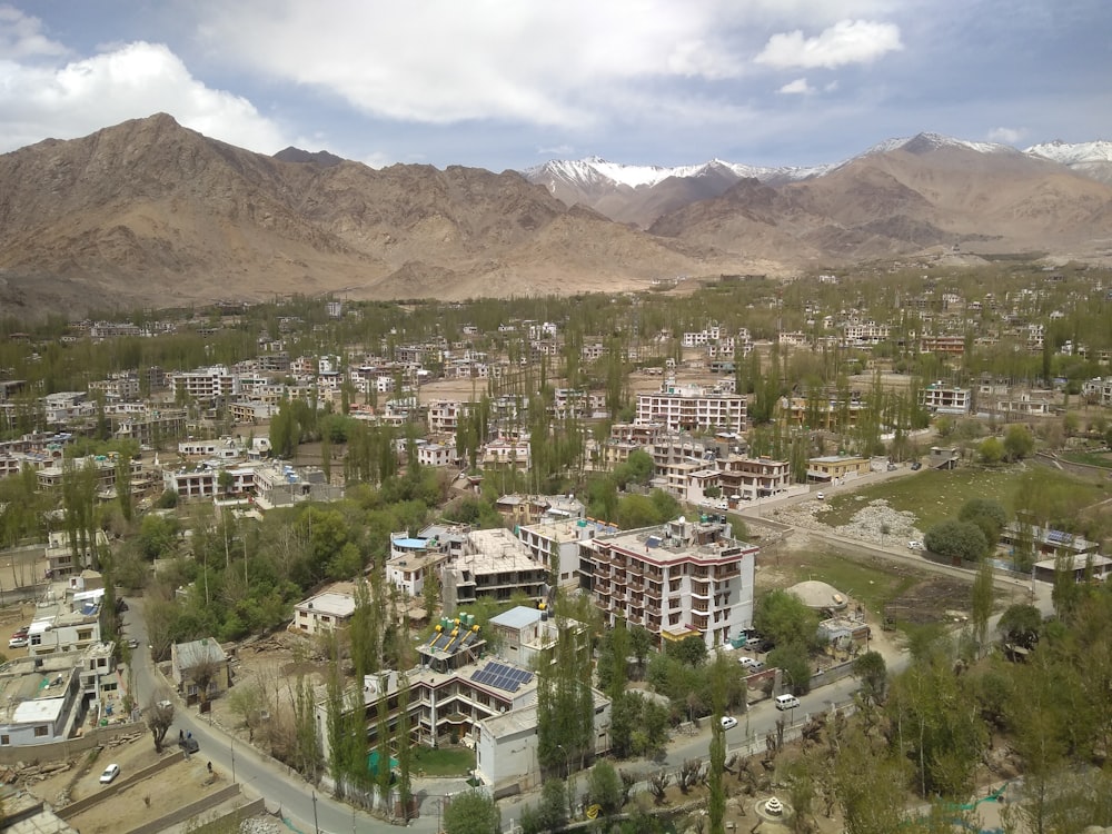 a city with mountains in the background