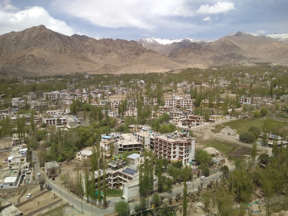 a city with mountains in the background