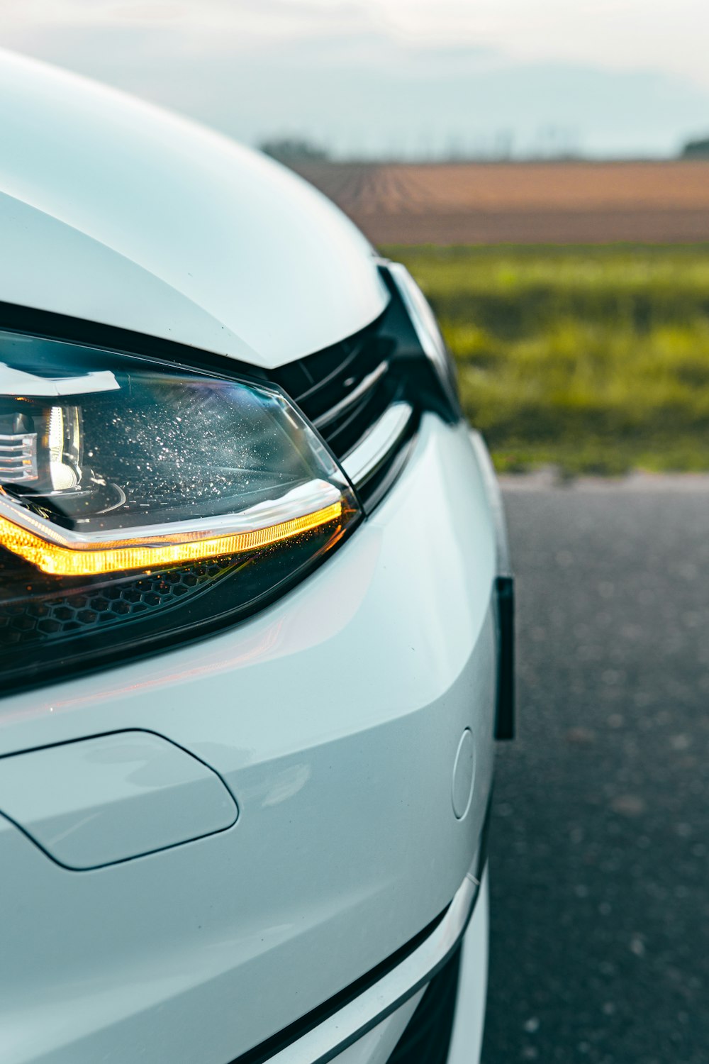 the front of a white car