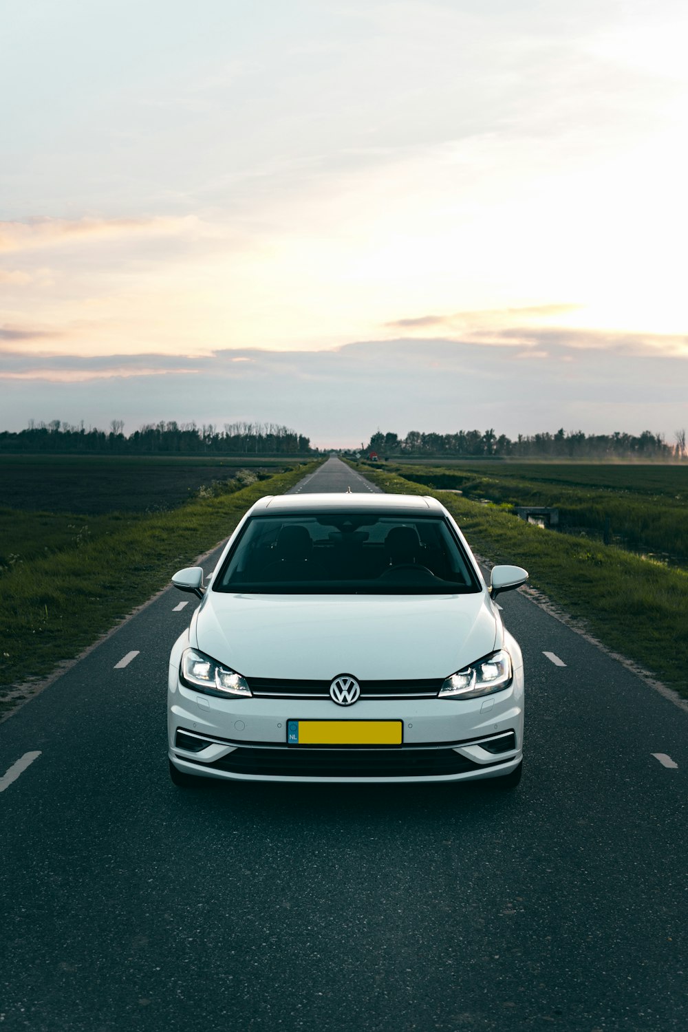 a white car on a road