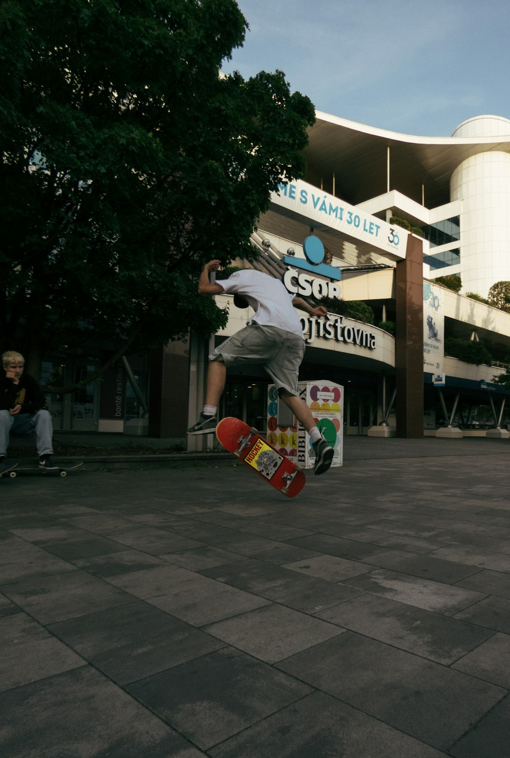 a man doing a trick on a skateboard