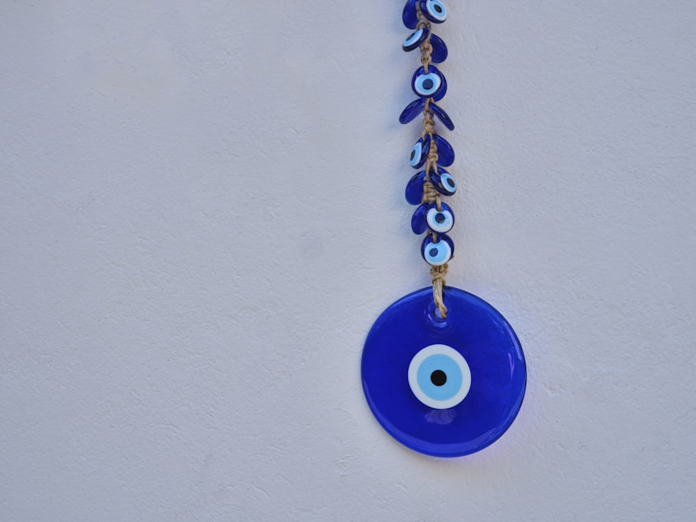 a blue and white necklace