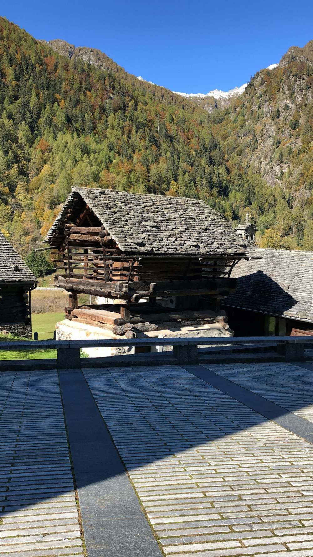 a building with a mountain in the background