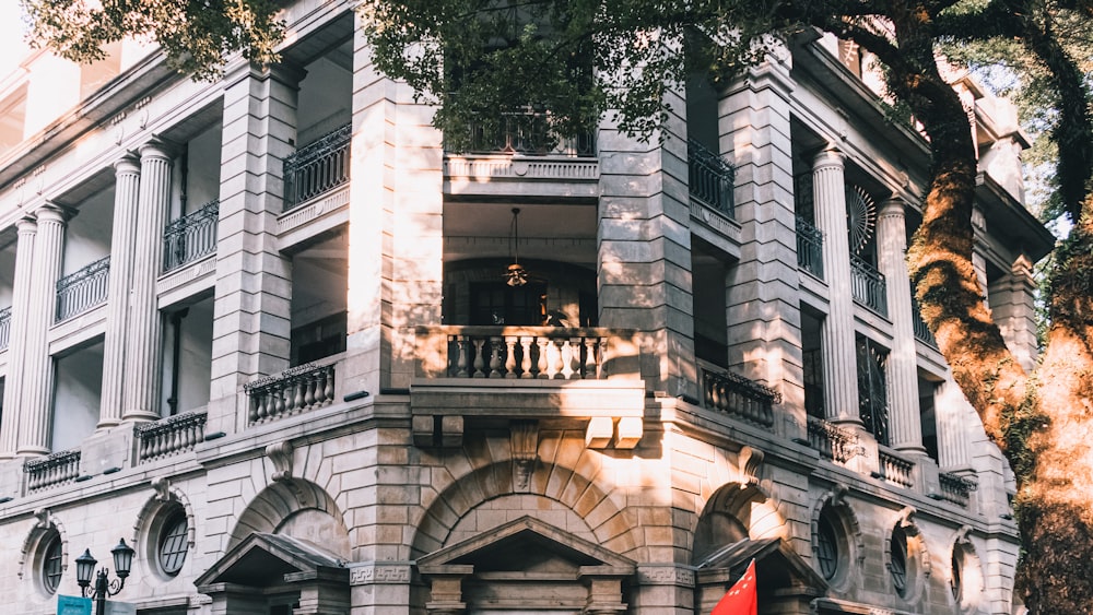 a large white building with a large balcony