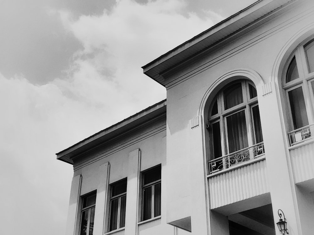 a white building with a balcony