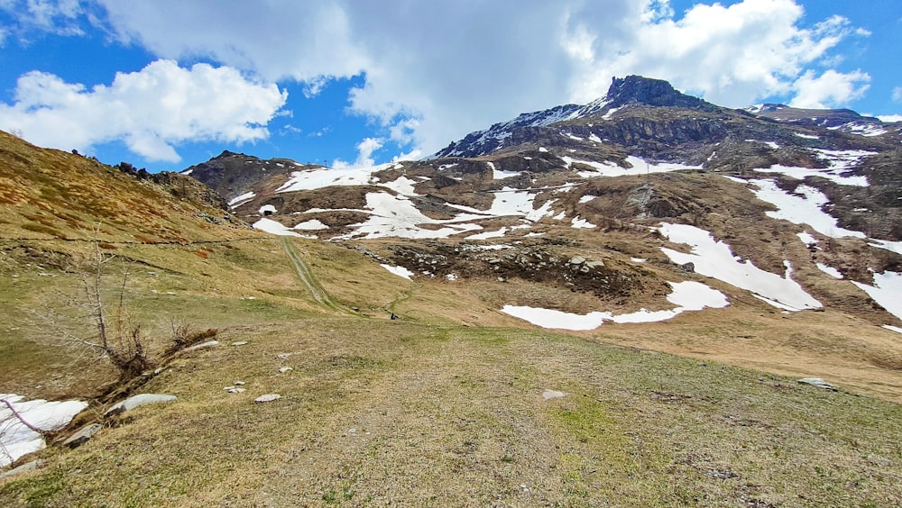 a view of a mountain with snow on it