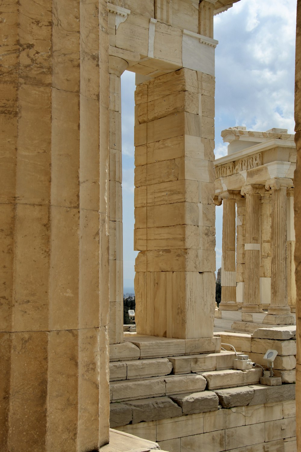 a group of stone pillars sitting next to each other