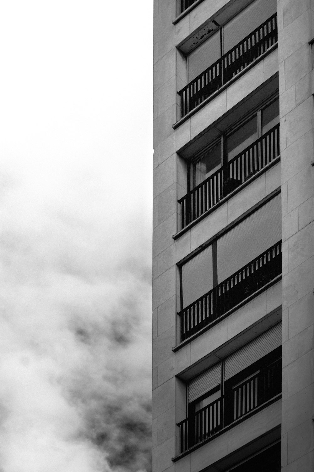 a black and white photo of a tall building