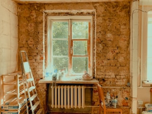 a room with a radiator and a window