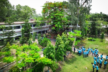 a group of people standing in front of a building
