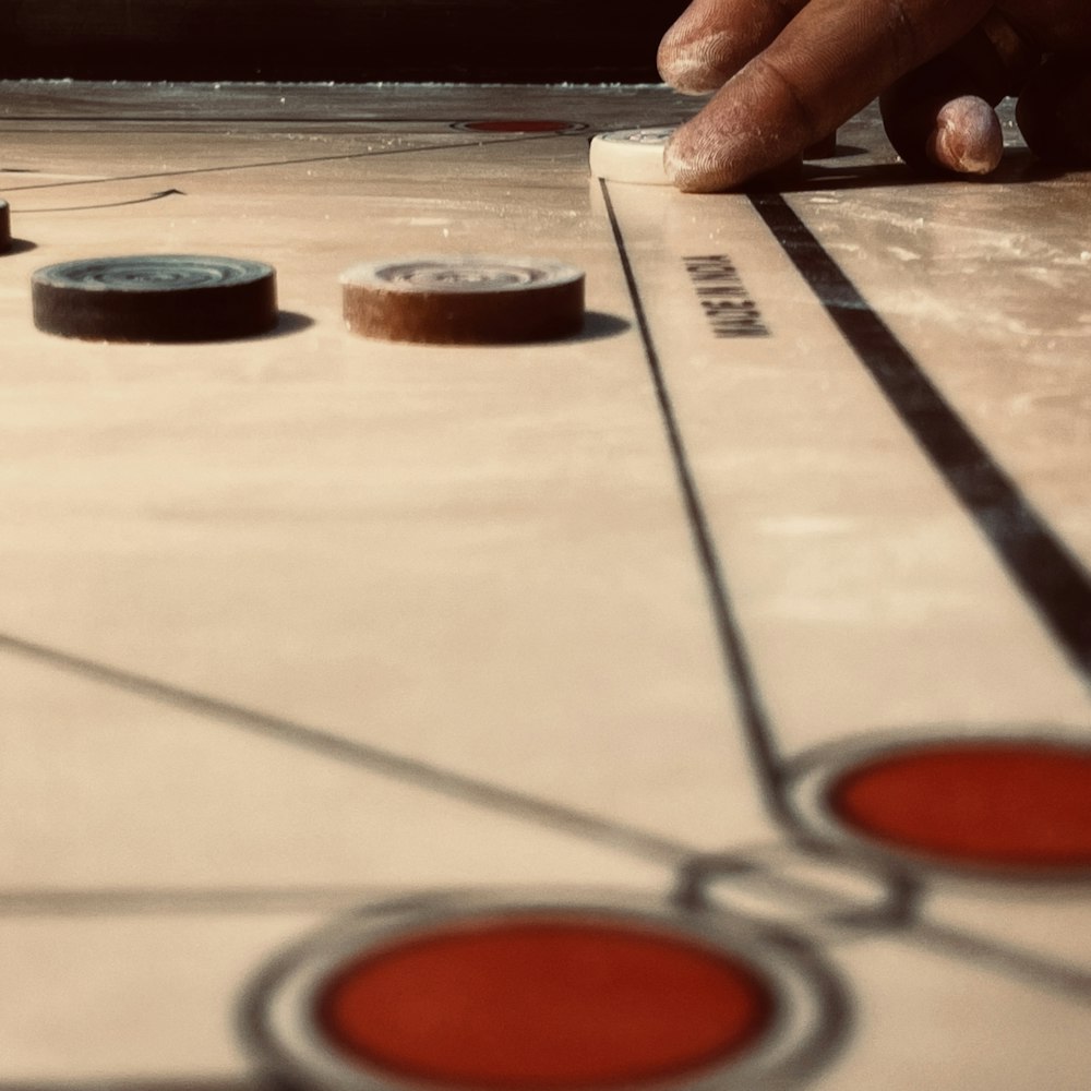 a close up of a person playing a board game