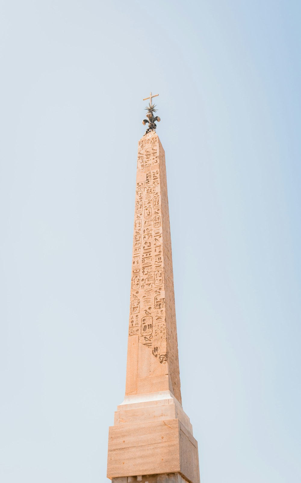 a monument with a cross on top of it