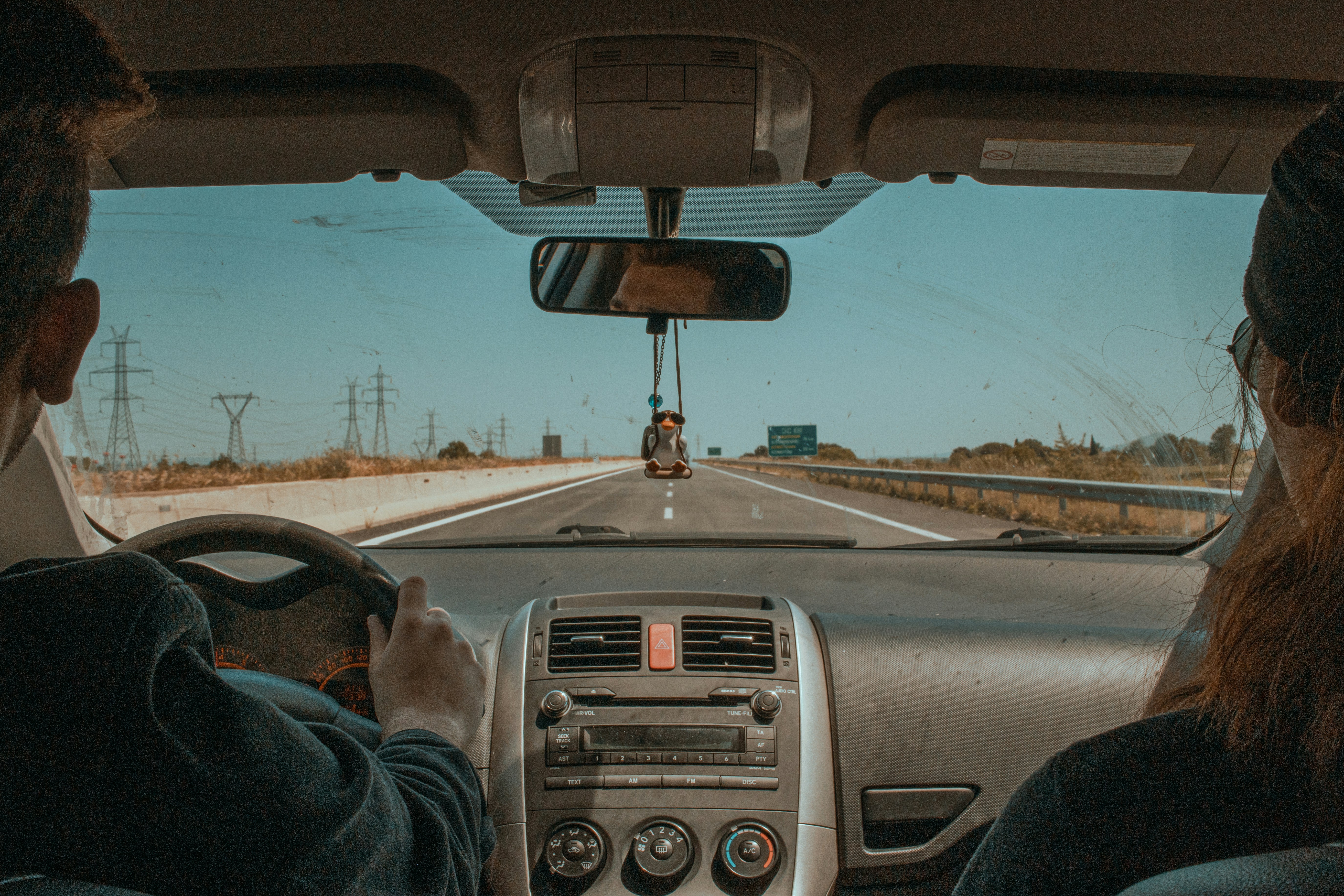 A couple of people in a car
