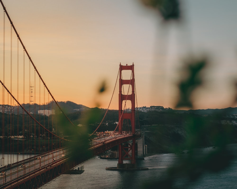 a view of the golden gate bridge at sunset