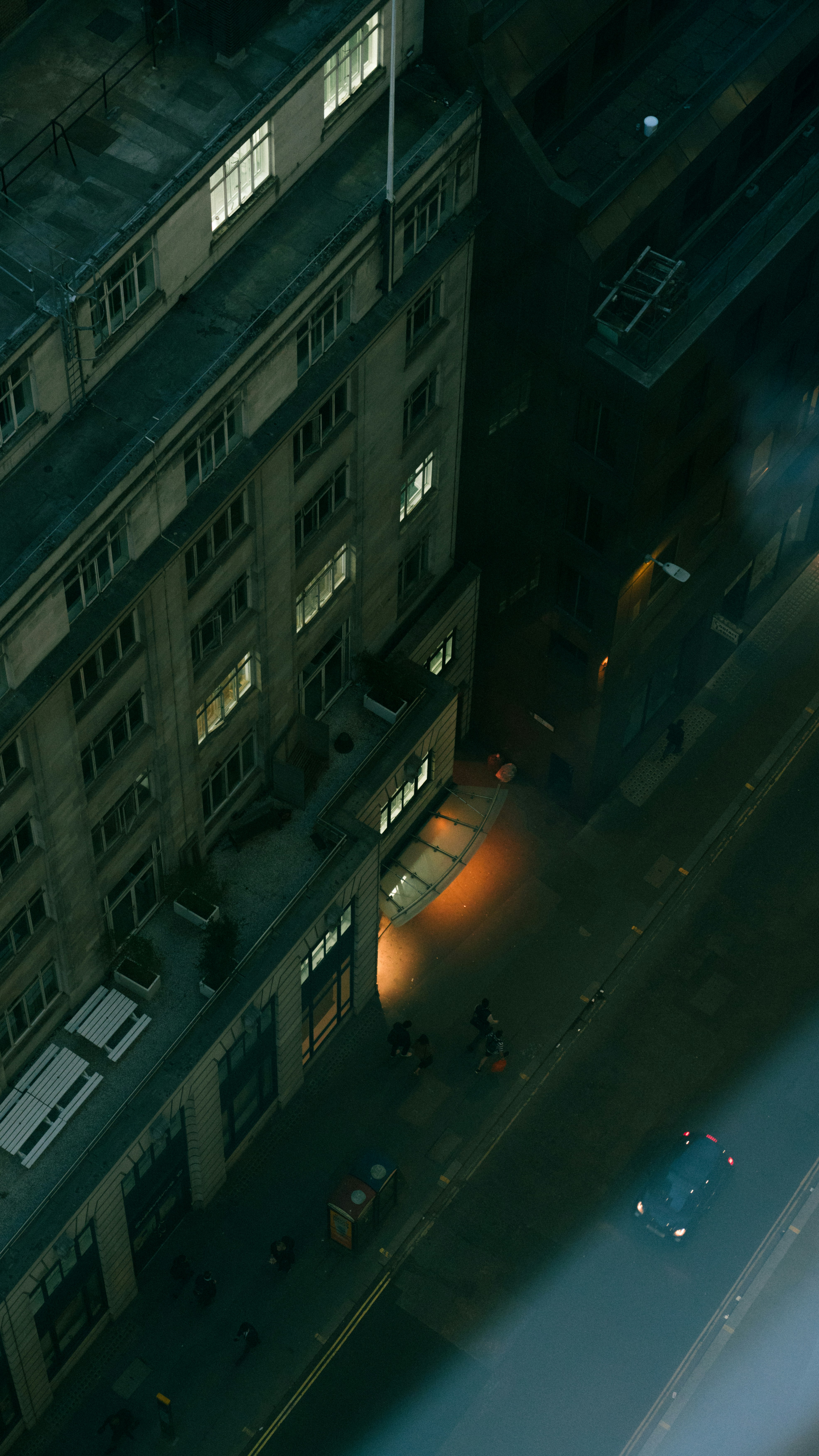 an aerial view of a building at night