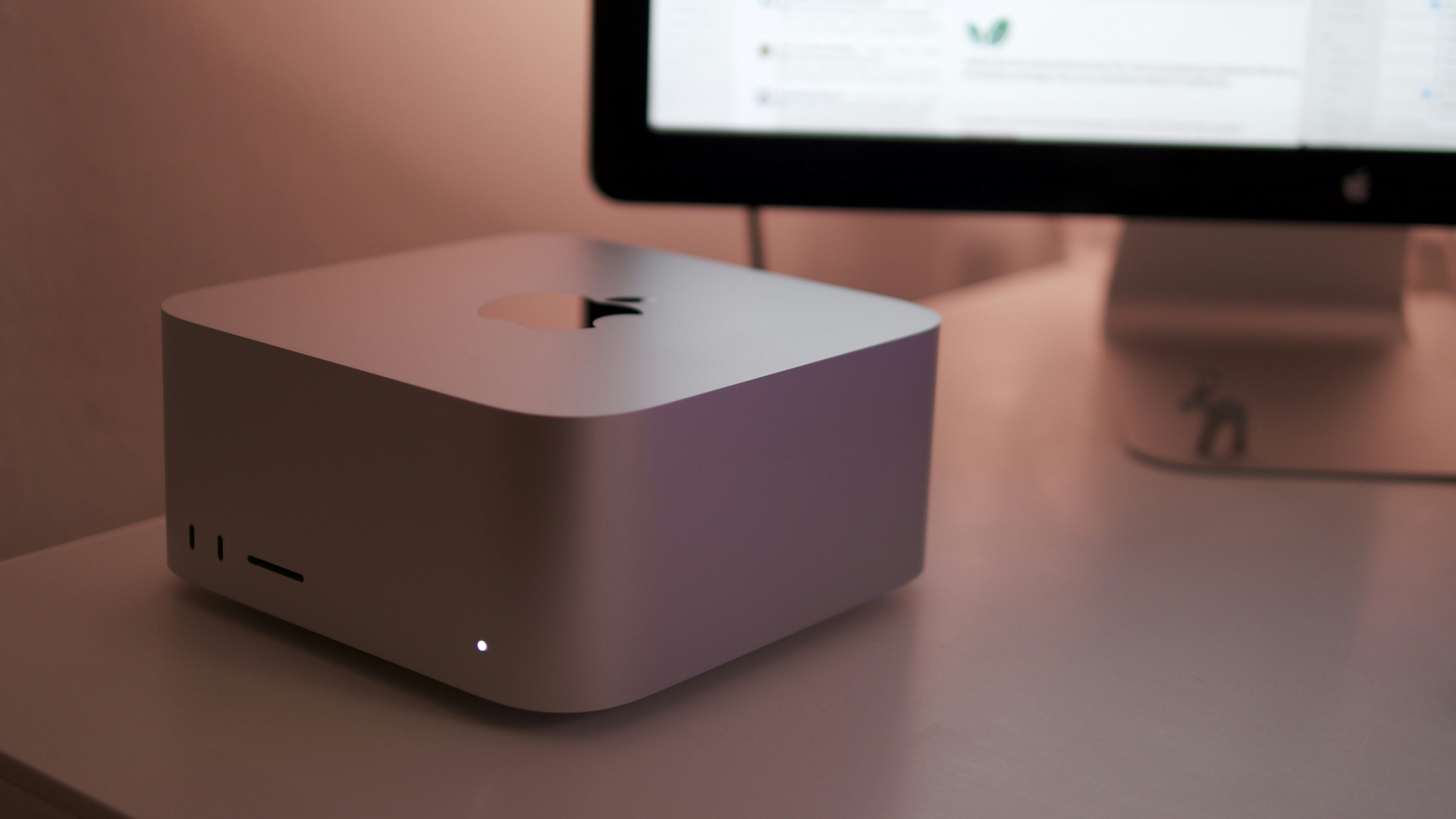 Modern Mac Pro desktop computer silver aluminum in clean studio setting