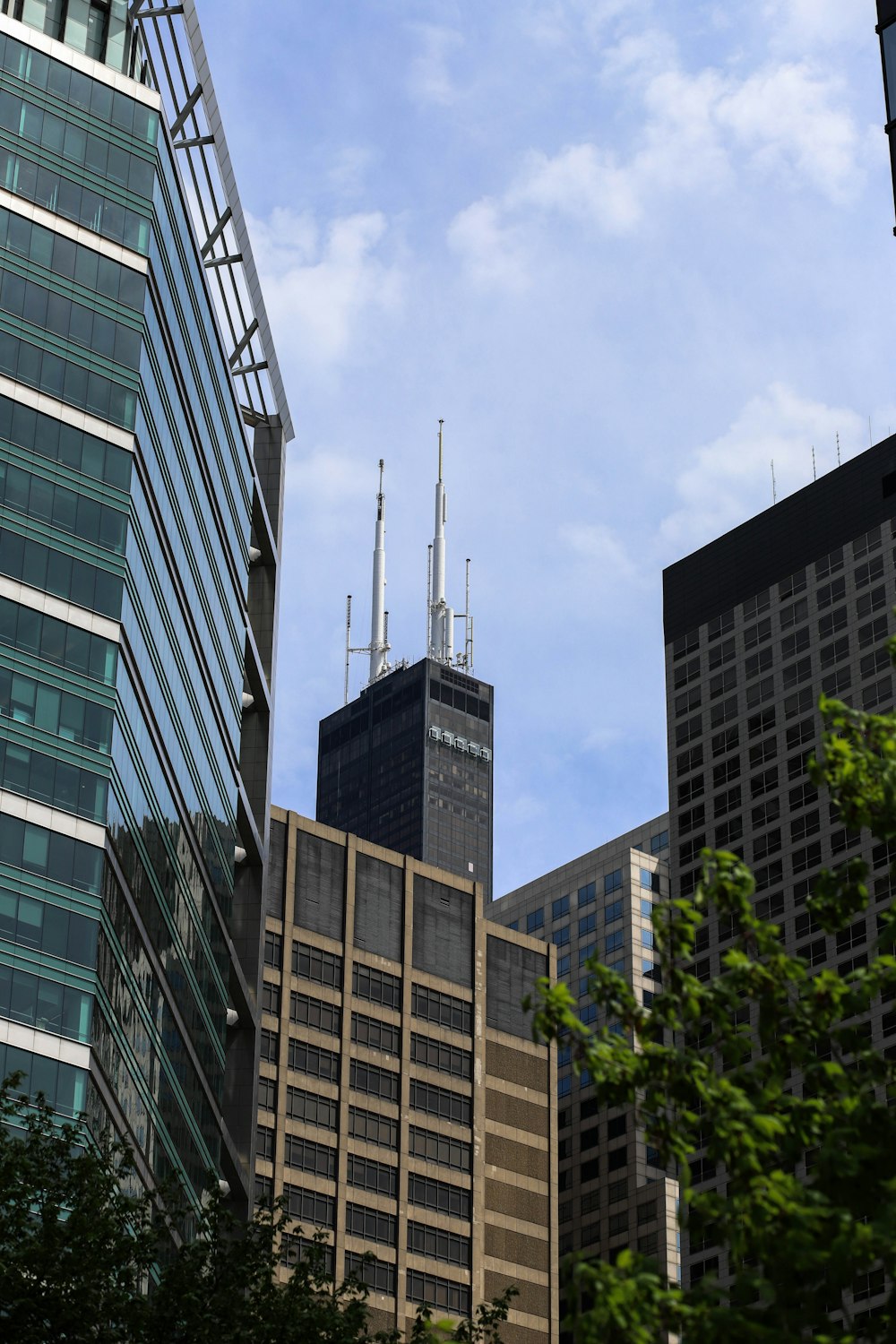 a group of tall buildings in a city